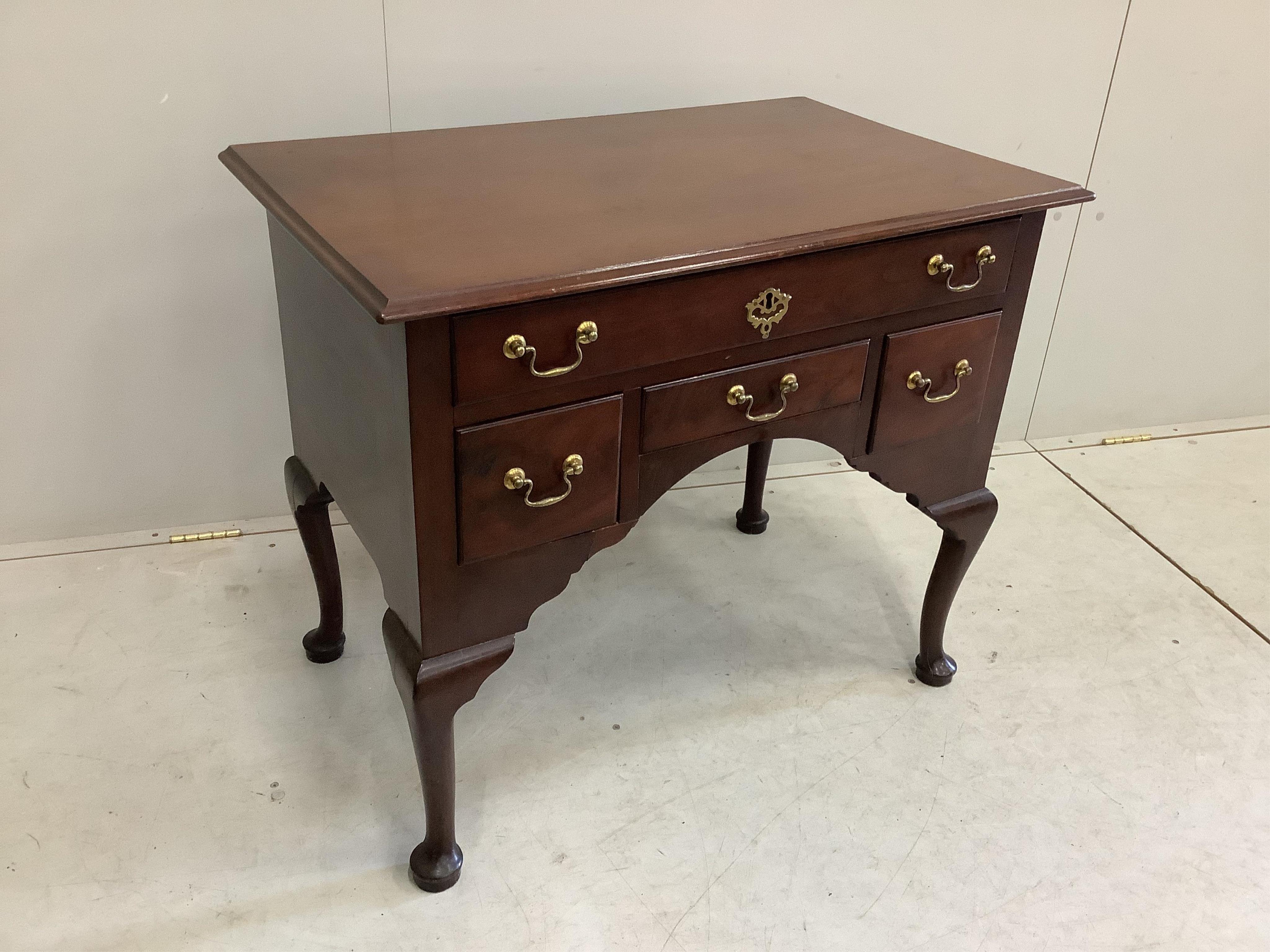 A George III mahogany lowboy, width 84cm, depth 52cm, height 71cm. Condition - fair to good